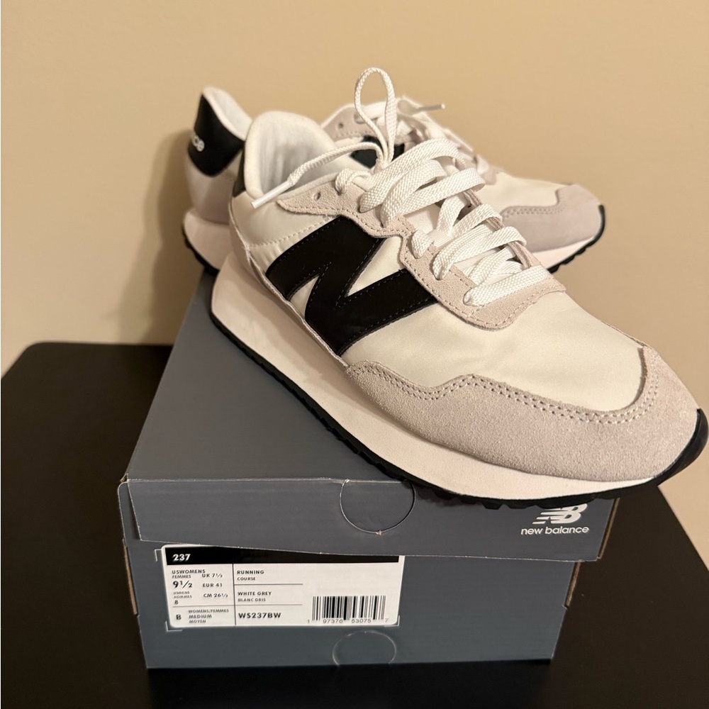 New Balance White and Black Retro Sneakers